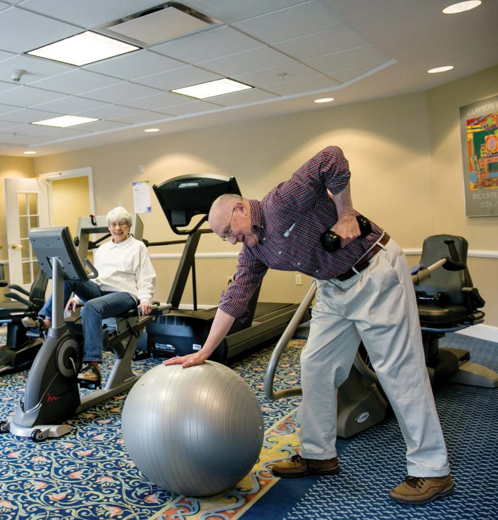 two people in fitness center