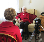 older woman being interviewed