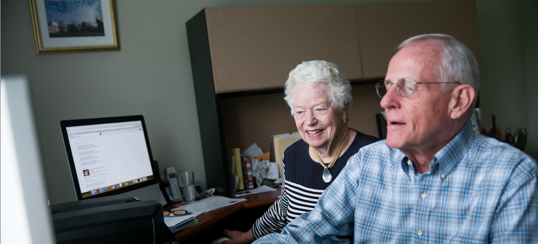 Couple researches senior living online