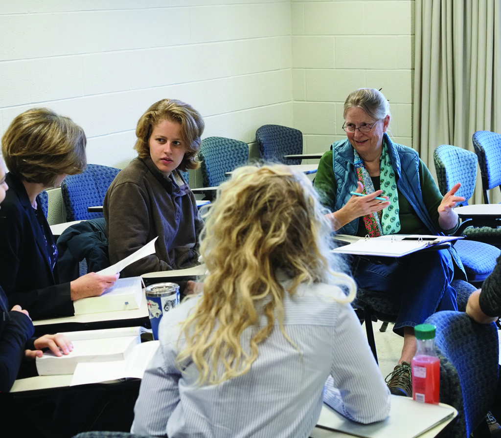 Oberlin College students in classroom with Kendal resident