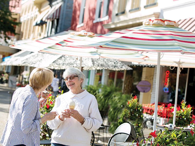 Residents enjoy Ice cream on Granville's main street