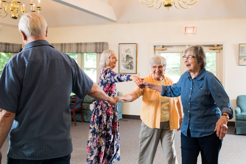 Senior living resident square dance