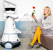 Robot hands rose to woman