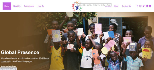 Kids holding handmade cards