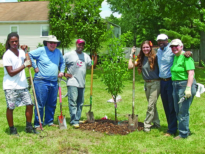 Senior Living residents and staff work toward sustainability goals by planting trees