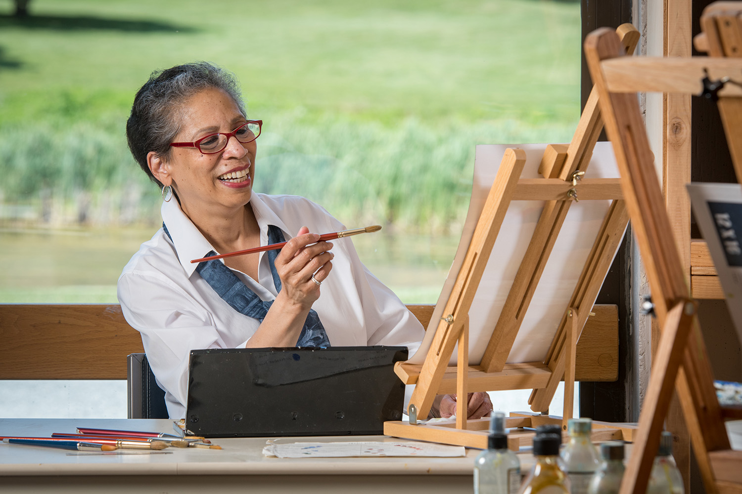 senior living resident paints