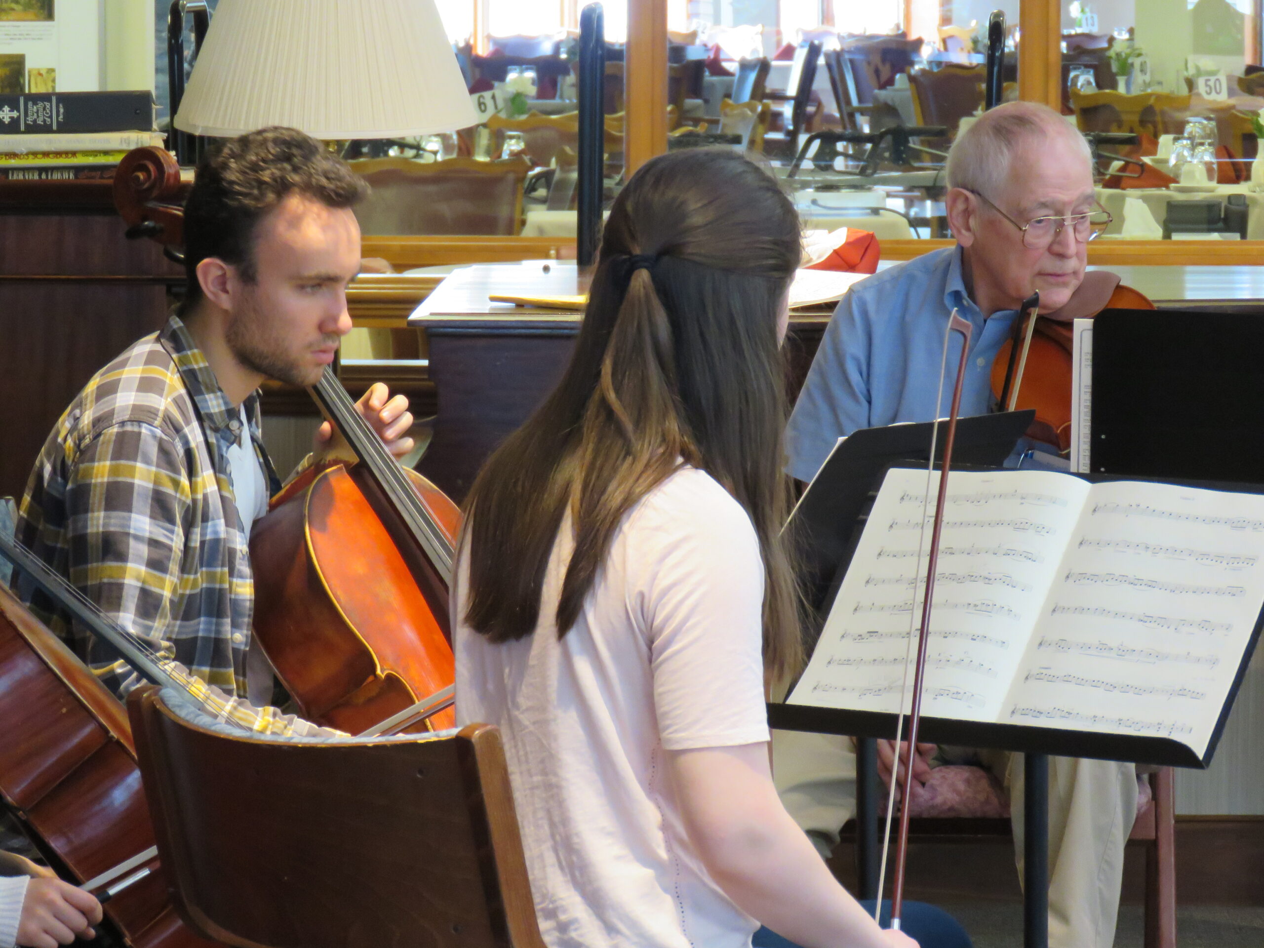 student musicians with resident
