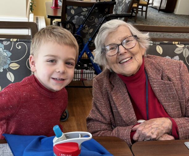 older adult woman and ELC child at Kendal at Hanover