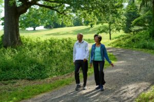Kendal on Hudson residents taking a walk around lake hudson